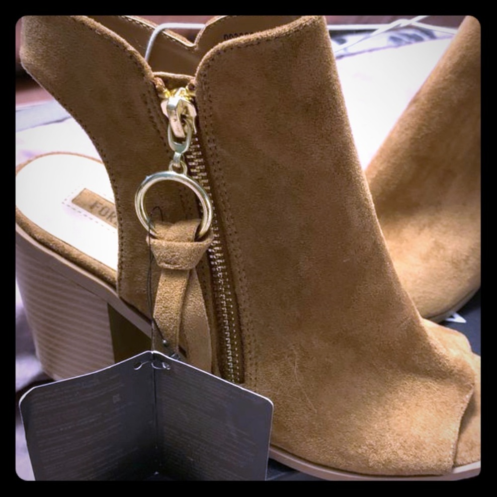 Booties Tan color. Size 6. Brand new! Never worn.